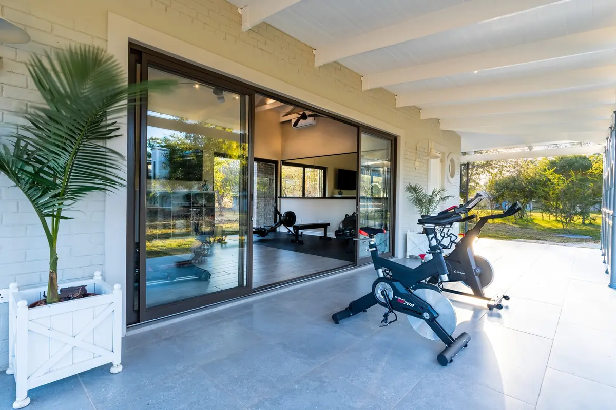 Gymnasium patio at The Palm River Hotel, Victoria Falls